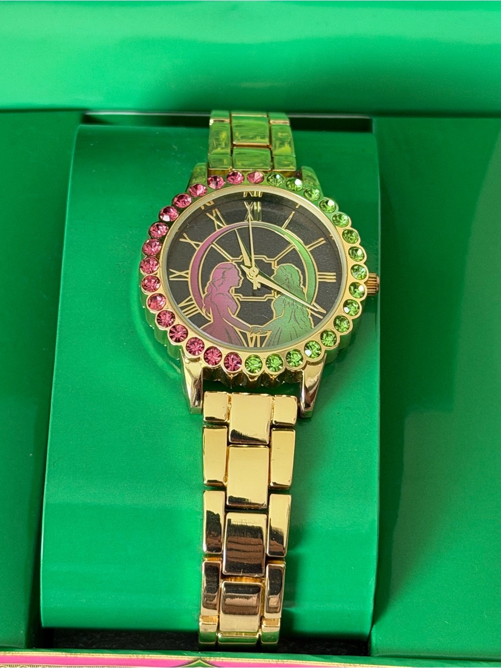 Wicked Gold-tone watch with Pink and Green Crystal Accents - Picture 5 of 7